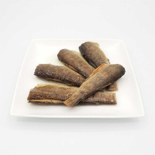 Smoked trout in olive oil on a plate